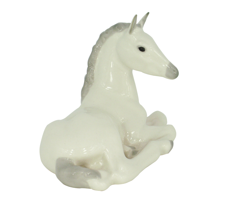 white ceramic horse statue